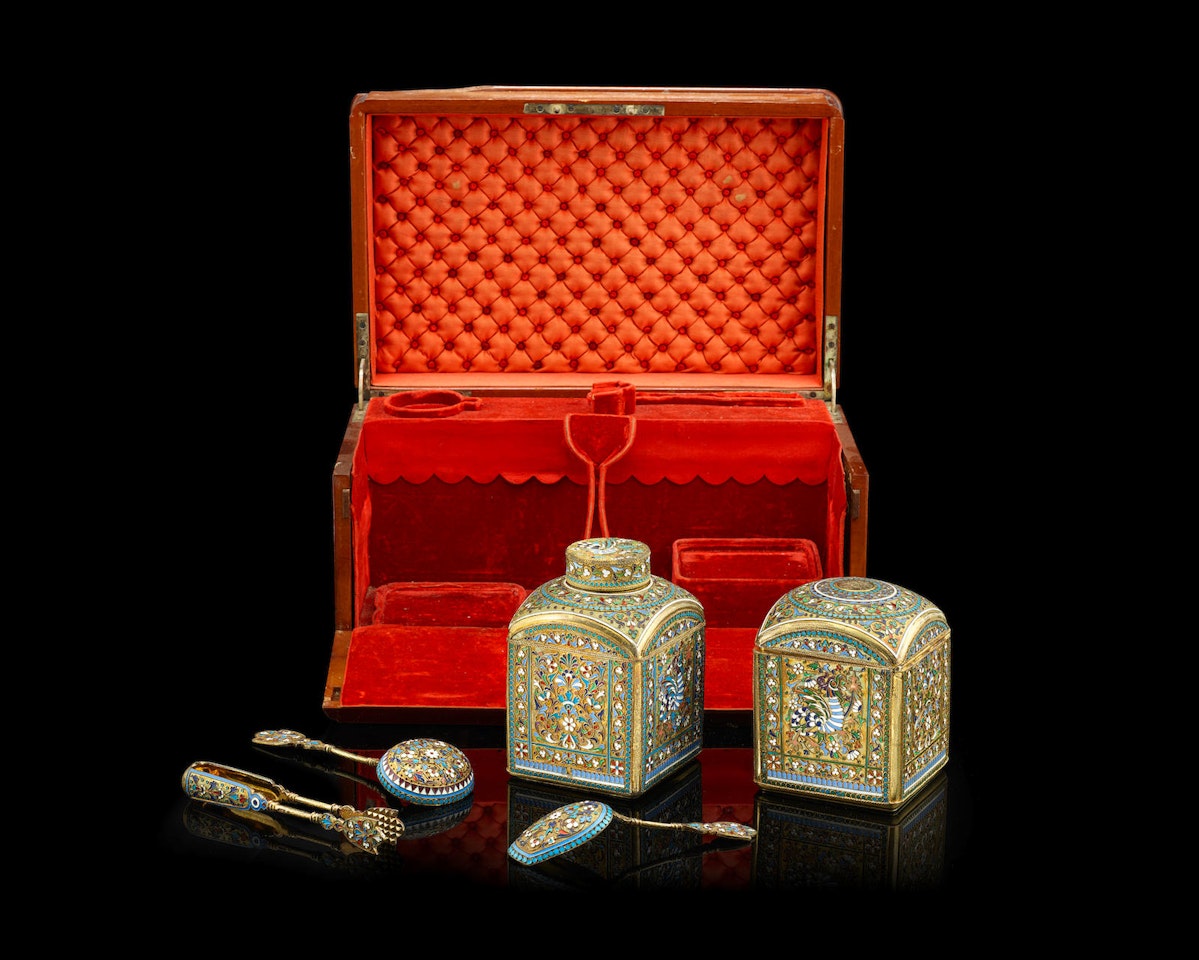 A silver-gilt and enamel travelling tea set by Anonymous