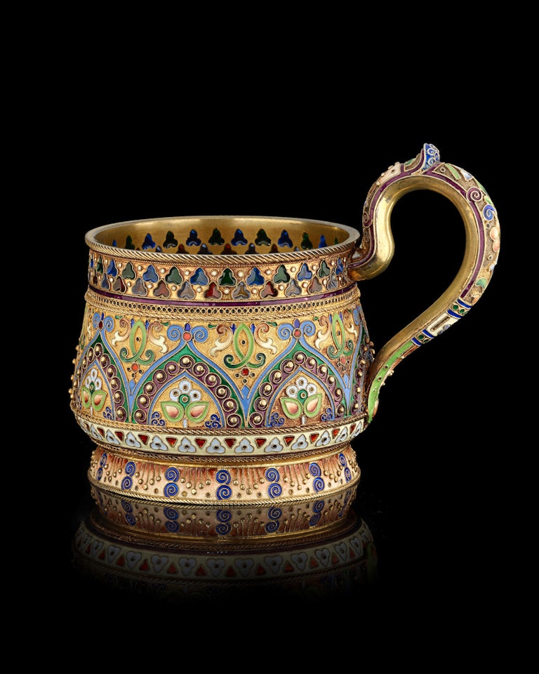 A silver-gilt, cloisonné and plique-à-jour enamel tea glass holder by Anonymous