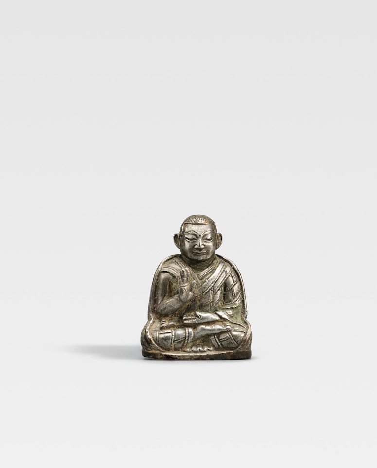 A SILVER FIGURE OF A KAGYU LAMA by Anonymous