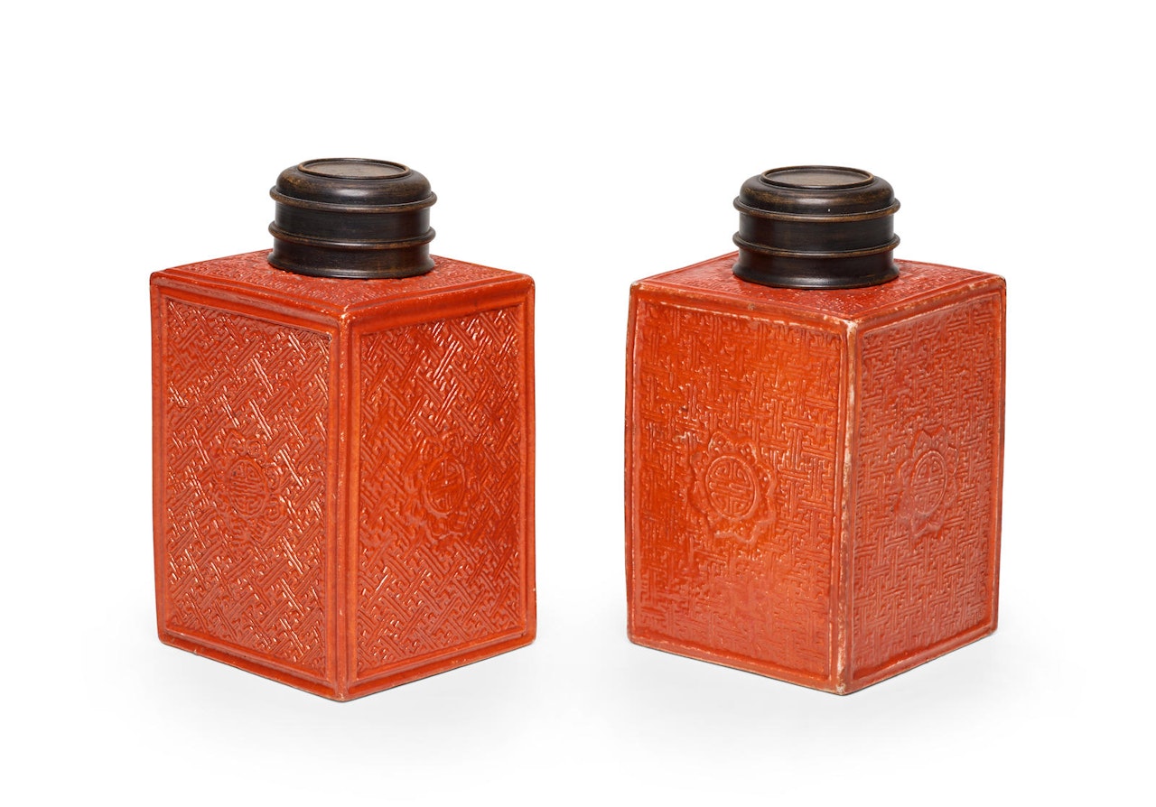A PAIR OF RED-GLAZED IMITATION CINNABAR LACQUER TEA CADDIES by Anonymous
