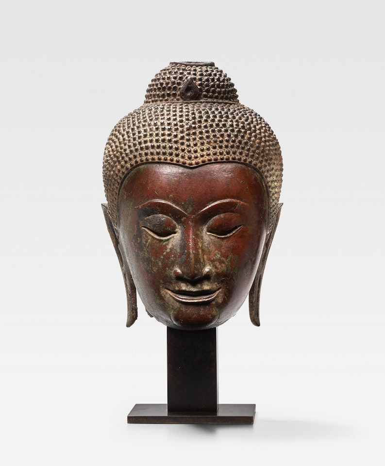 A COPPER ALLOY HEAD OF BUDDHA by Anonymous