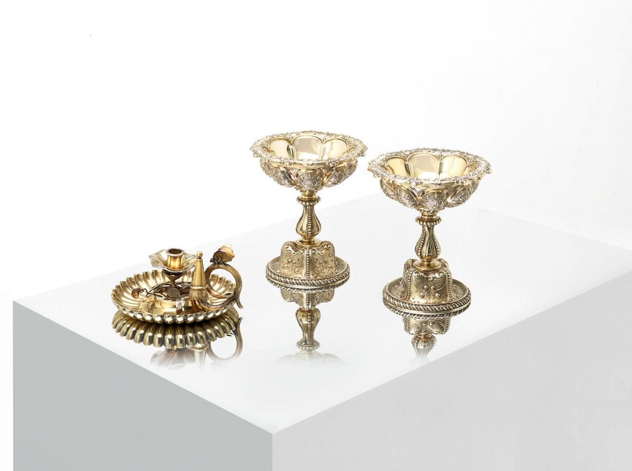 A George IV silver-gilt chamberstick by Phillip Rundell by Anonymous
