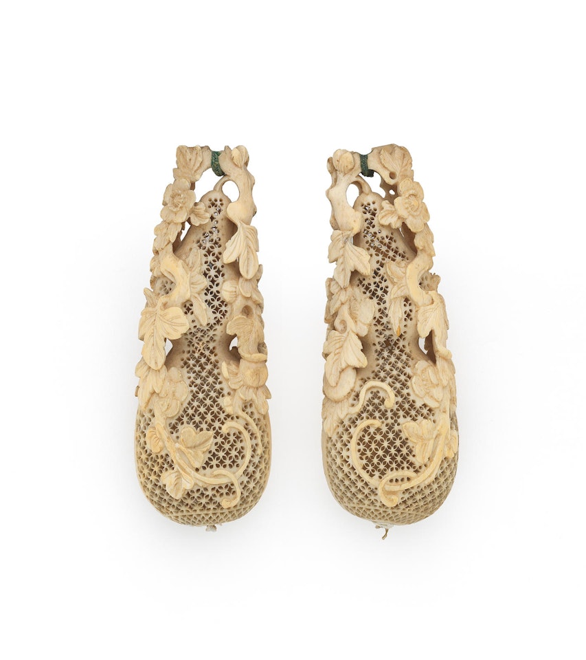 A pair of ivory openwork pomanders by Anonymous