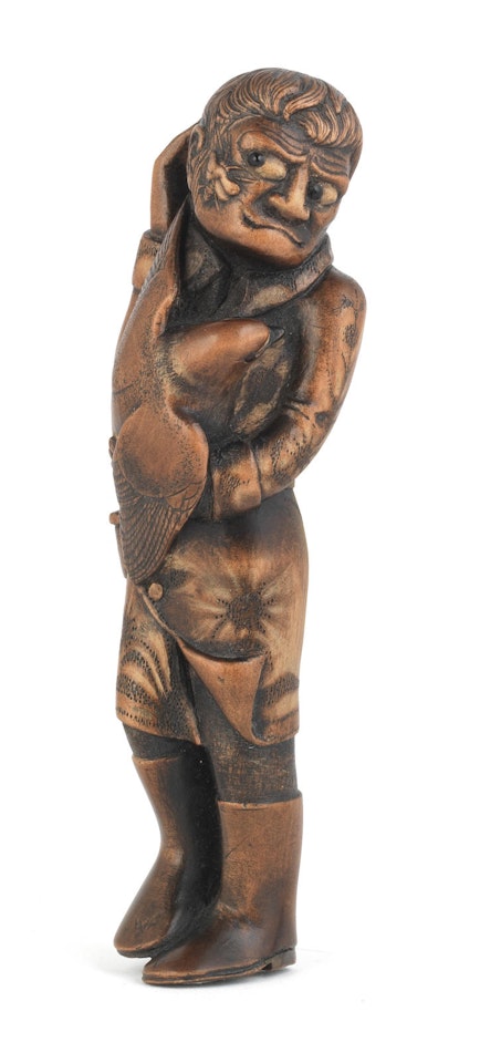 A large boxwood netsuke of the hunter, the dove and the bee, By Jack Coutu (1924-2017) by Anonymous