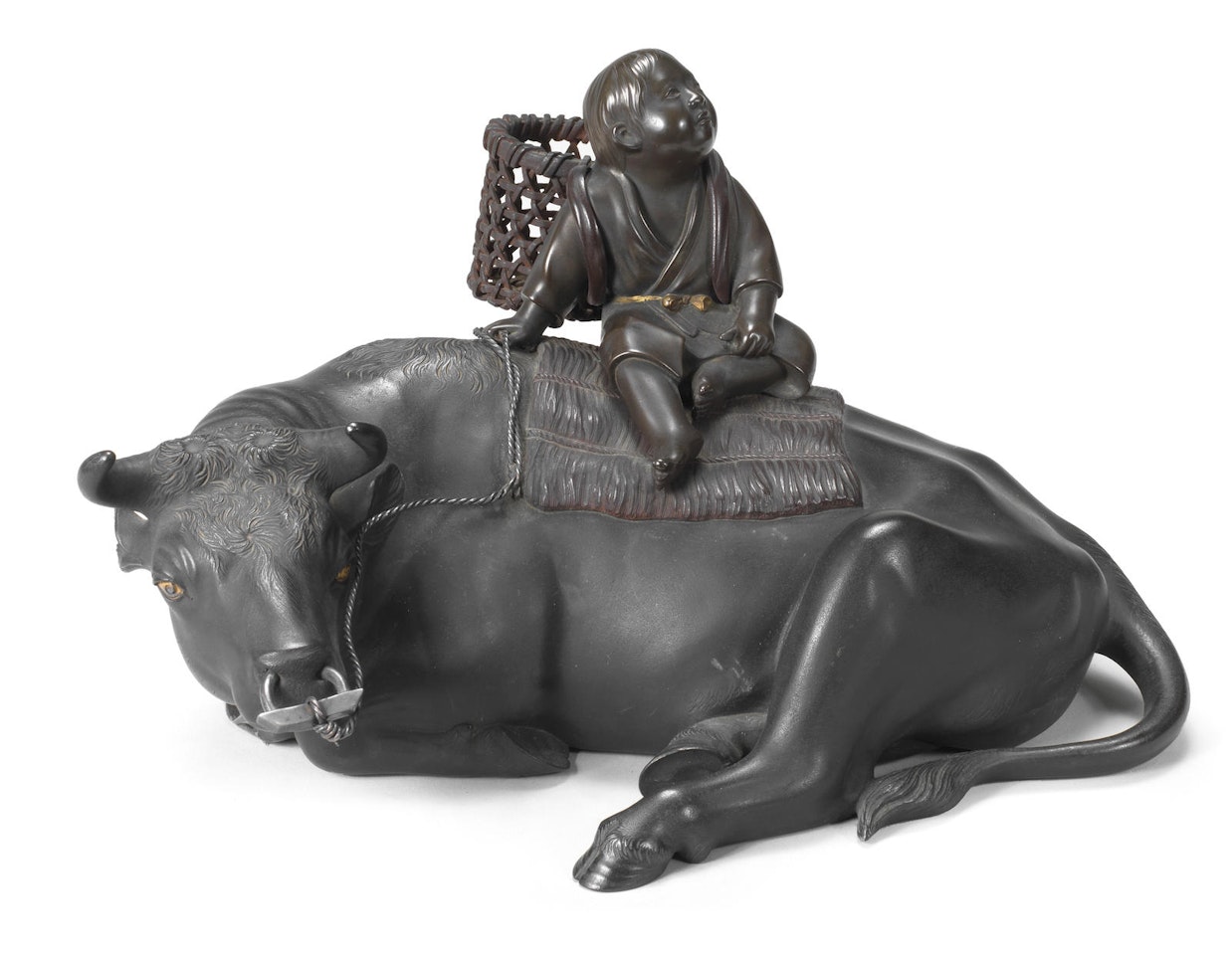 A Bronze okimono of a boy on an ox, By Sekiguchi Shinya (1877-1932) by Anonymous