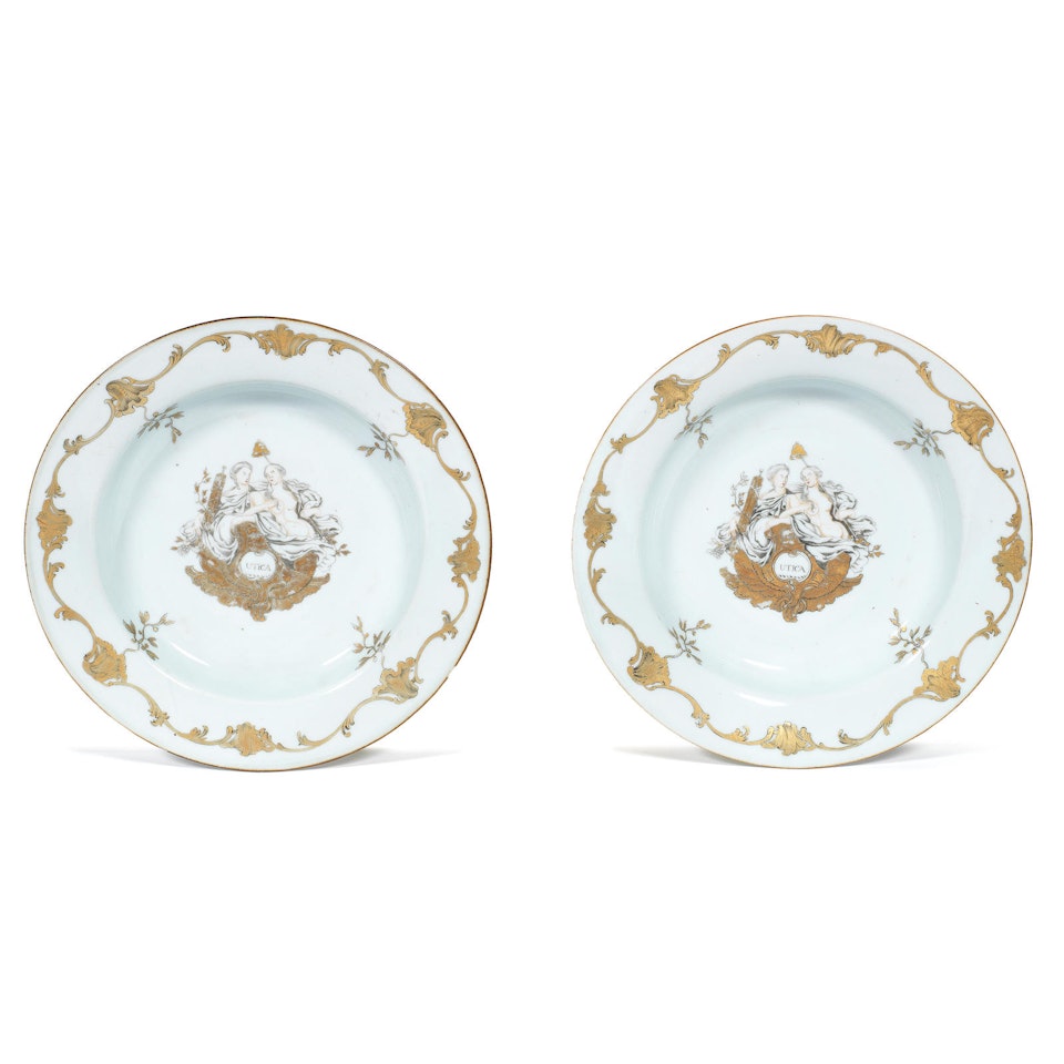 A pair of gilt and en-grisaille 'Utica' dishes by Anonymous