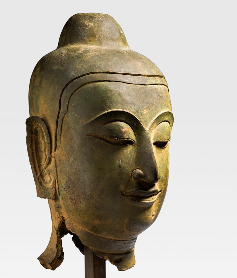 A LARGE COPPER ALLOY HEAD OF BUDDHA by Anonymous