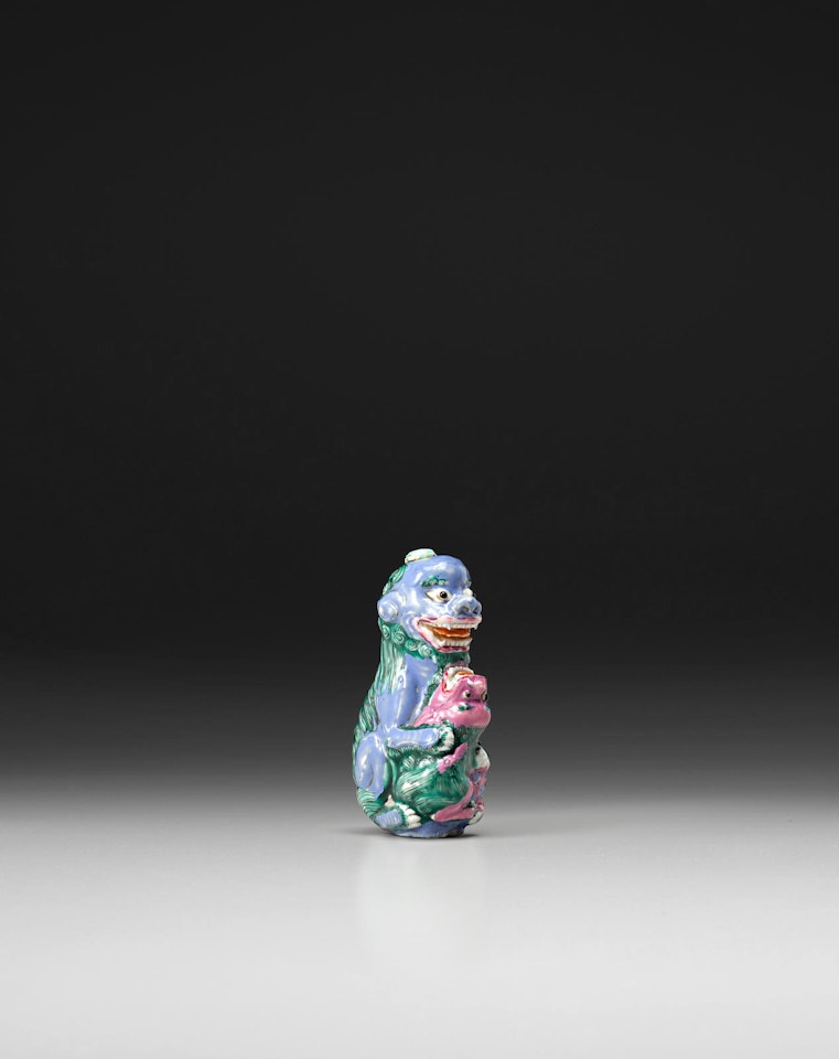 A MOLDED PORCELAIN SNUFF BOTTLE by Anonymous