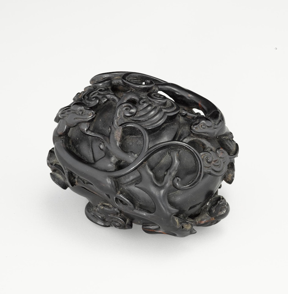 A reticulated hardwood ovoid box and cover by Anonymous