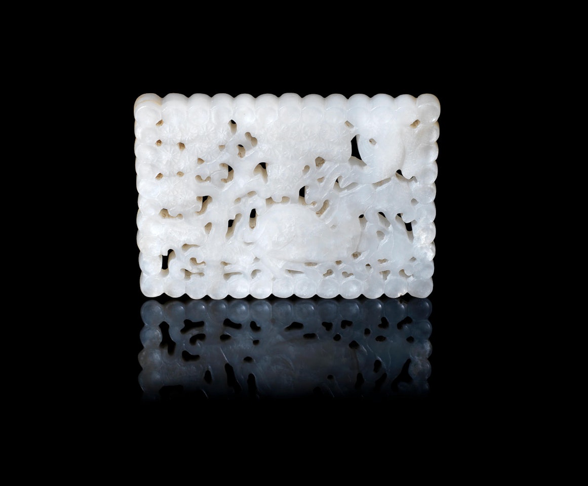 A reticulated white jade 'deer and crane' plaque by Anonymous