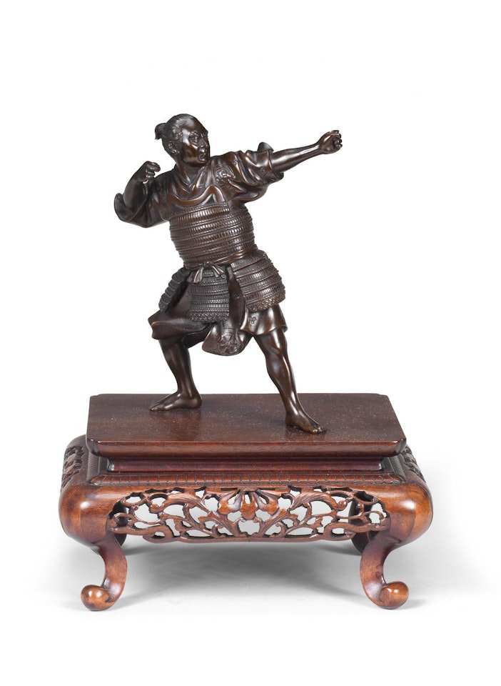 A bronze figure of an archer by Anonymous