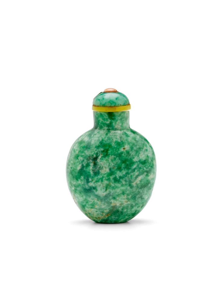 A MOTTLED GREEN JADEITE SNUFF BOTTLE by Anonymous
