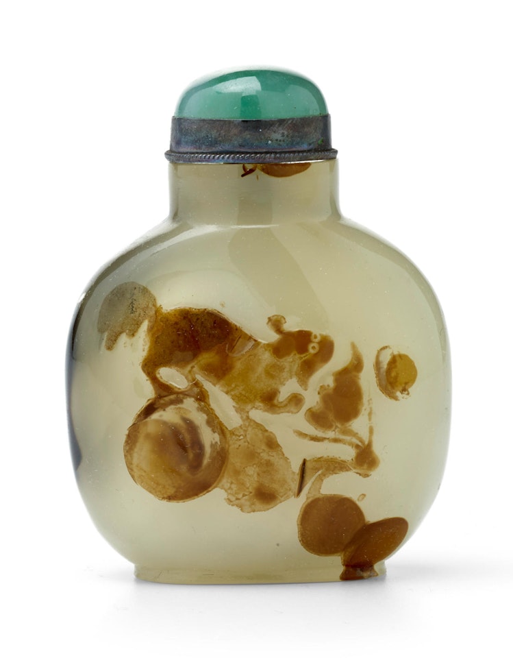 A SHADOW AGATE 'DOG AND BATS' SNUFF BOTTLE by Anonymous