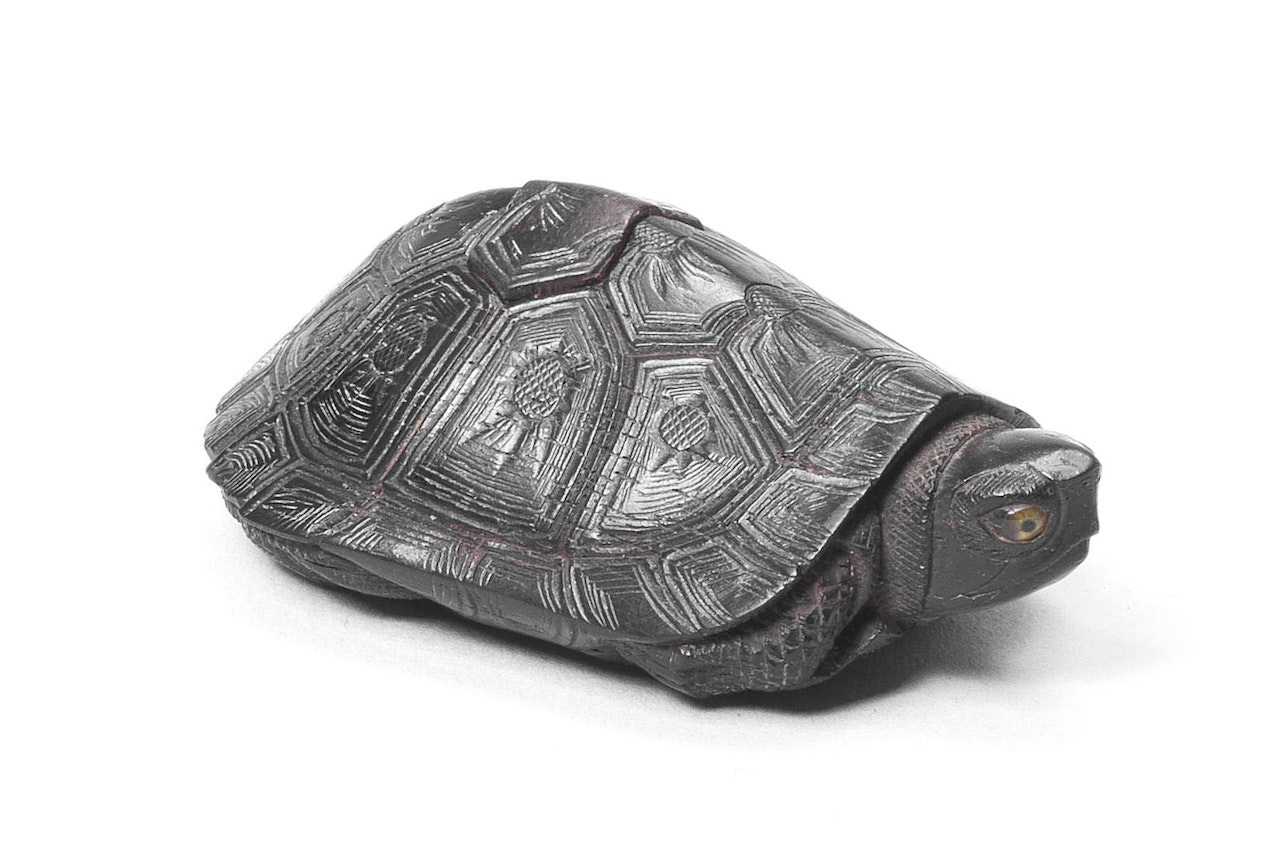 An ebony netsuke of a tortoise by Anonymous