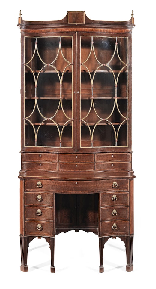An unusual George III fiddleback mahogany, sabicu banded and satinwood inlaid serpentine bookcase-on-desk by Anonymous