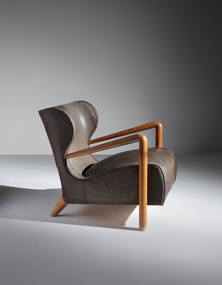 Rare wingback armchair by Jean Royere