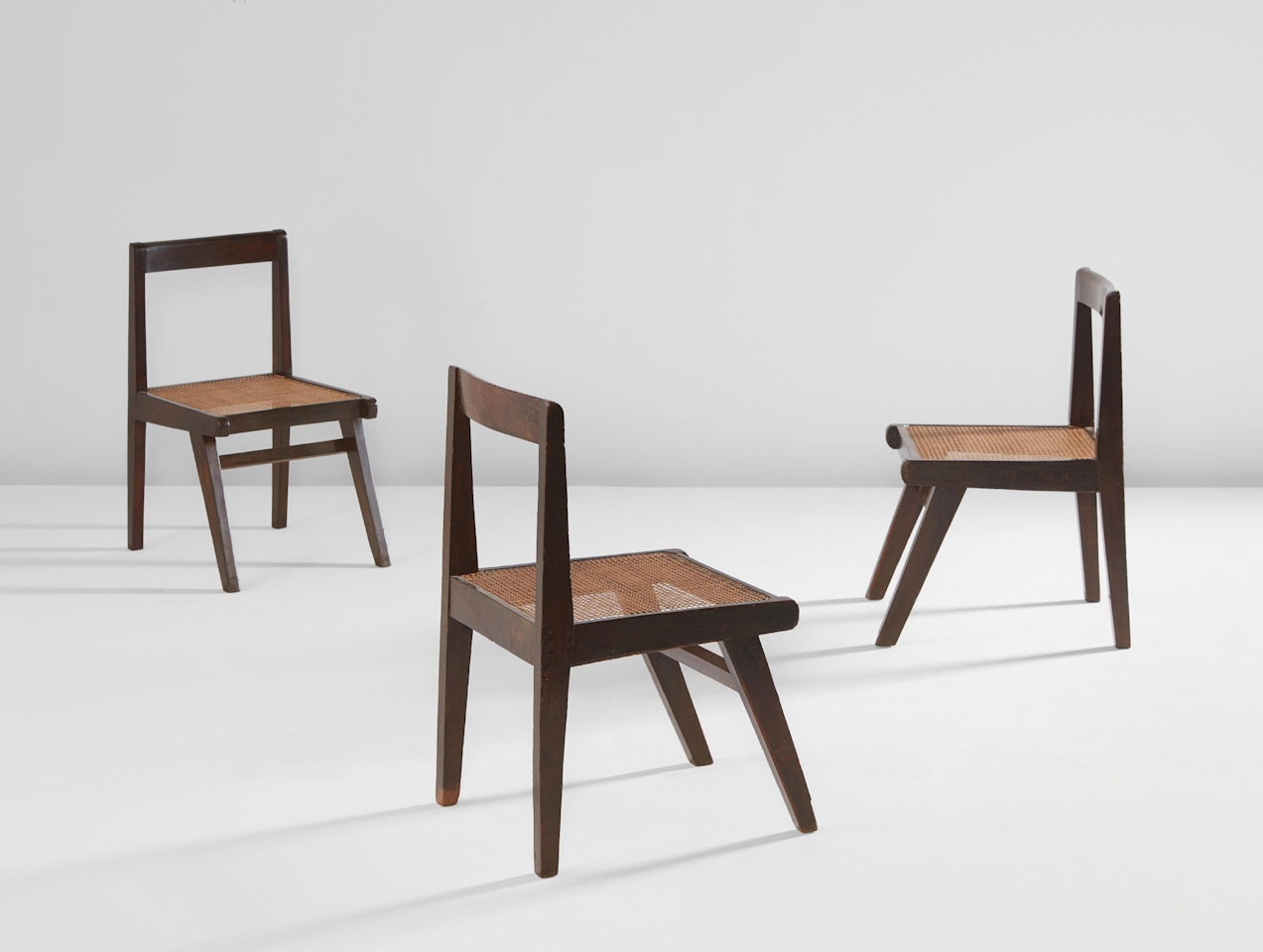 Three chairs, model no. PJ-SI-15-A, designed for the Himalayan Hostel cafeteria and private residences, Chandigarh by Pierre Jeanneret