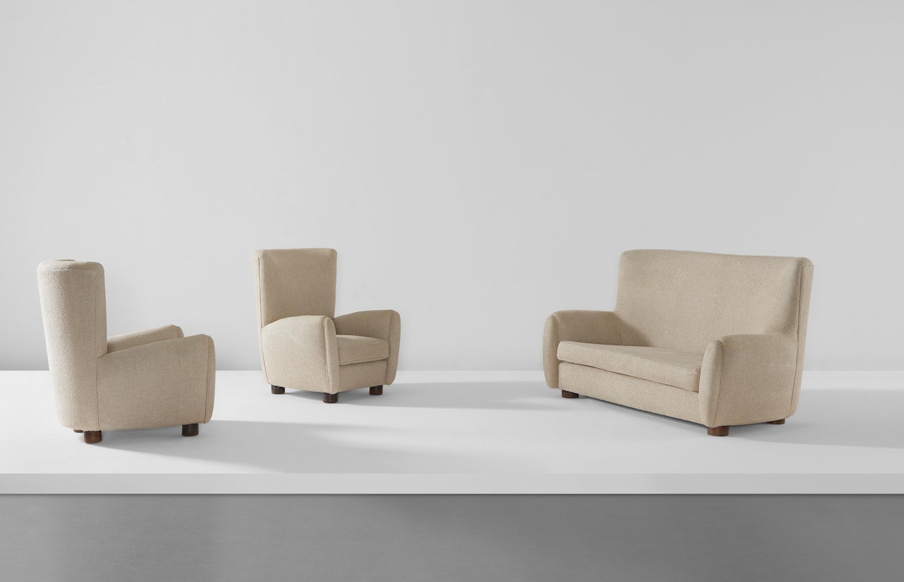 "Relax" sofa and pair of armchairs by Jean Royere