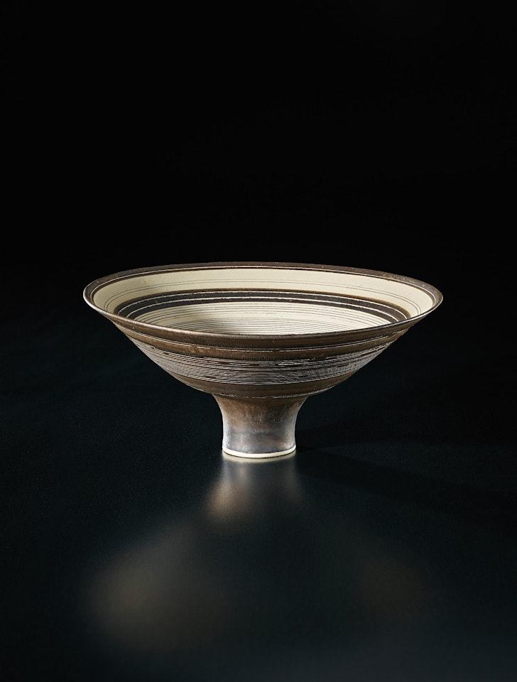 Flaring footed bowl by Lucie Rie
