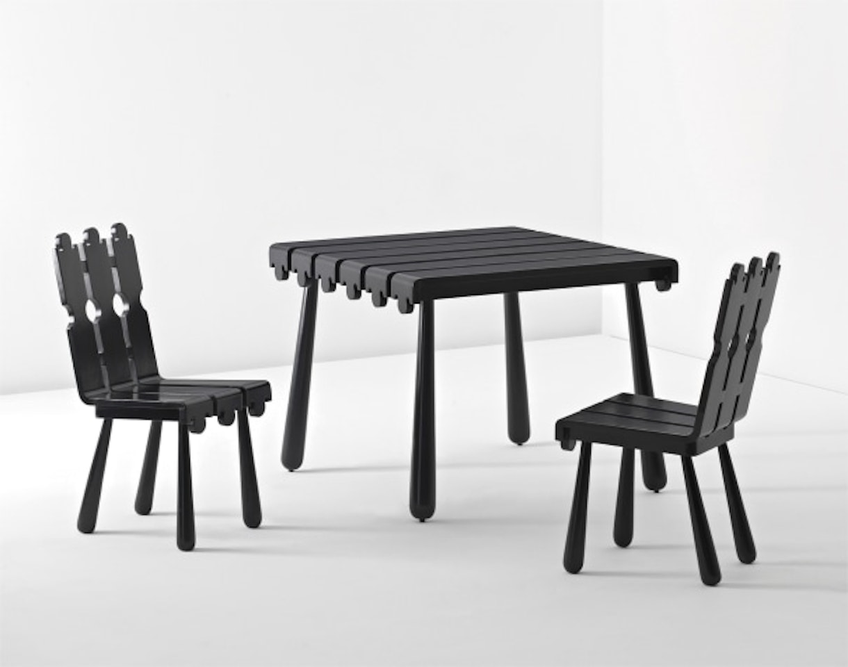 'Quille' table and pair of chairs by Jean Royere