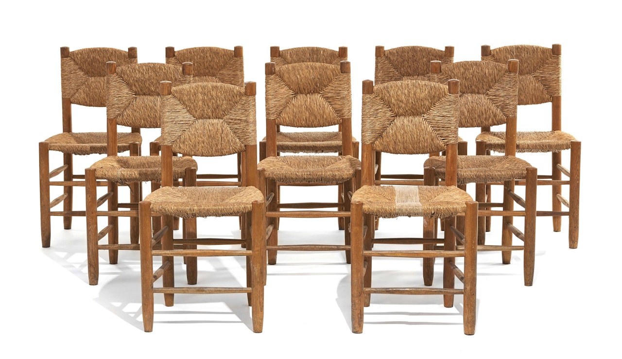 Suite de dix chaises dites "Bauche" by Charlotte Perriand