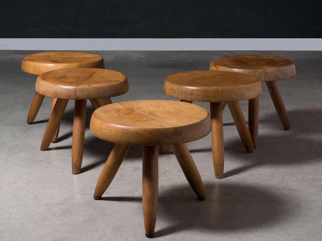 Suite de cinq tabourets dits "Berger" by Charlotte Perriand