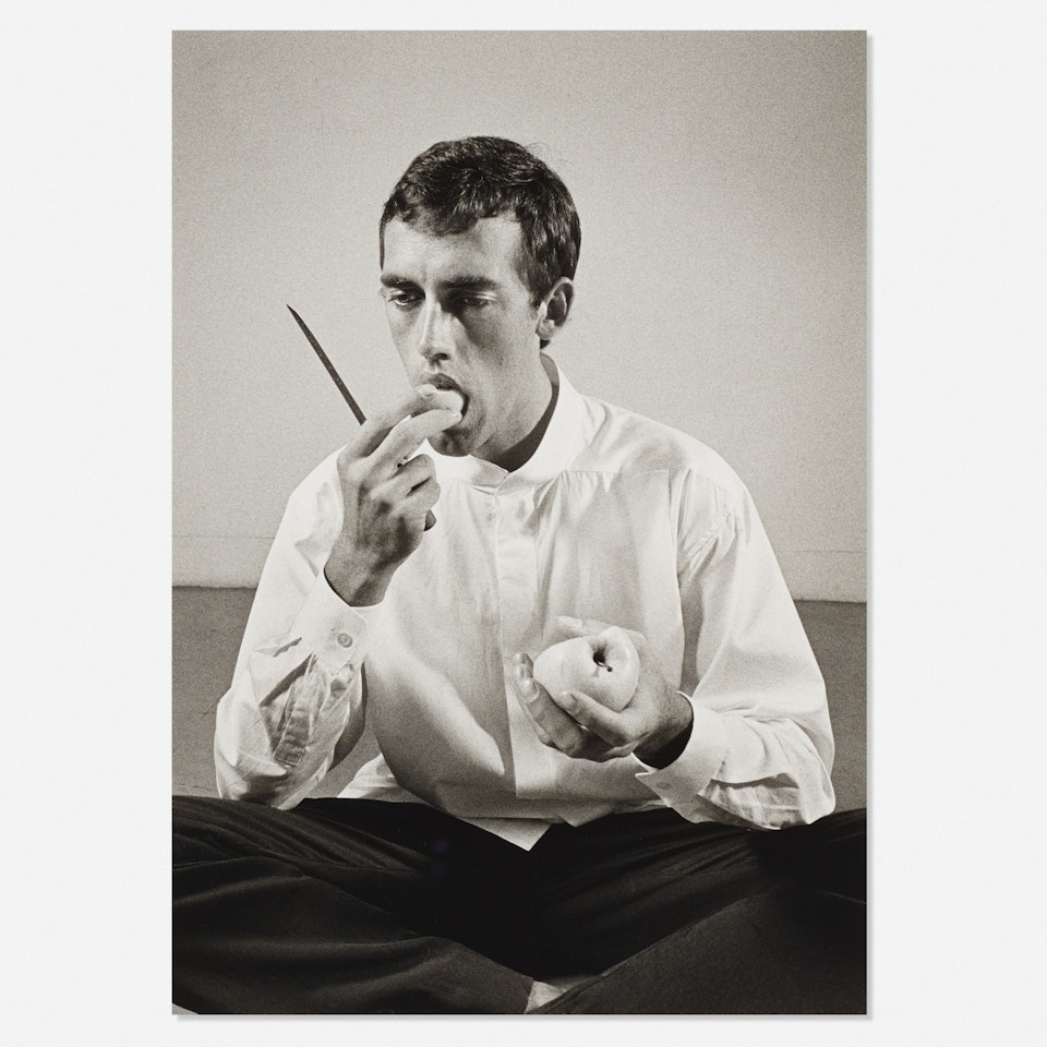 Forbidden Fruit (David Wojnarowicz Eating an Apple in an Issey Miyake shirt) from The Twelve Perfect Christmas Gifts from Dianne B. portfolio by Peter Hujar