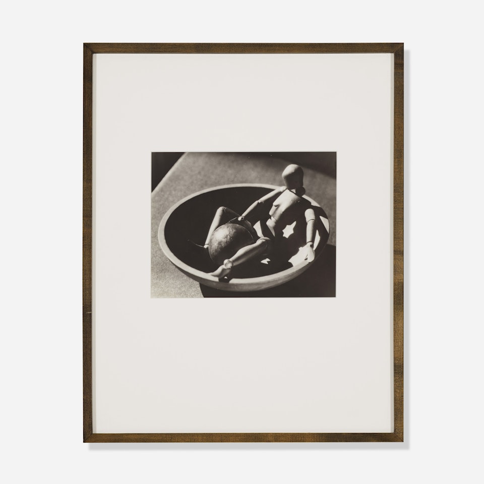 Lay Figure in a Bowl by Man Ray