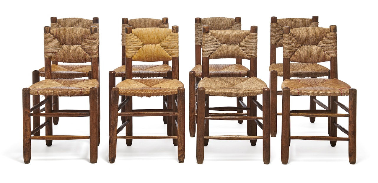 Suite de huit chaises dites « Bauches » by Charlotte Perriand