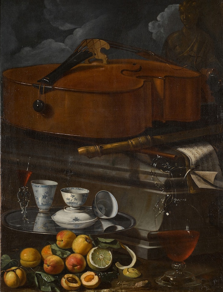 STILL LIFE WITH PORCELAIN CUPS AND A FAÇON DE VENISE GLASS ON A SALVER, WITH A GLASS WINE EWER, PEELED LEMON AND APRICOTS, BEFORE A PLINTH WITH A VIOLONCELLO, RECORDER, AND MUSICAL SCORES by Cristoforo Munari