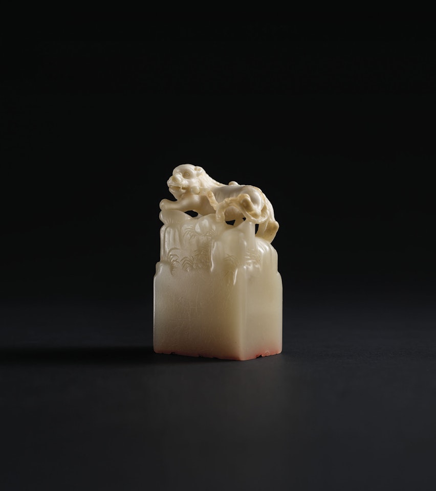 AN IMPERIAL ‘HANWEI JINGJI’ SOAPSTONE SEAL by Anonymous