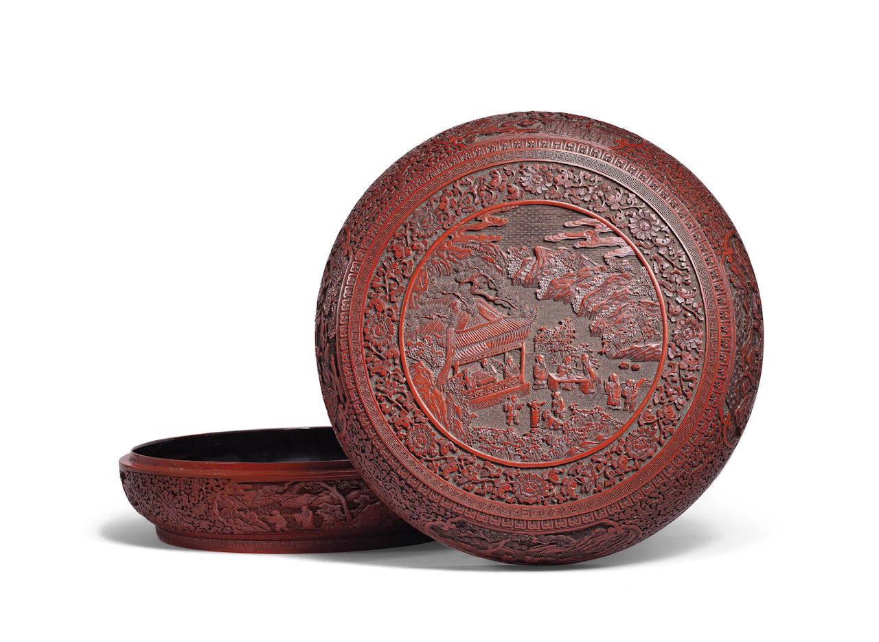 A LARGE CARVED CINNABAR LACQUER BOX AND COVER by Anonymous