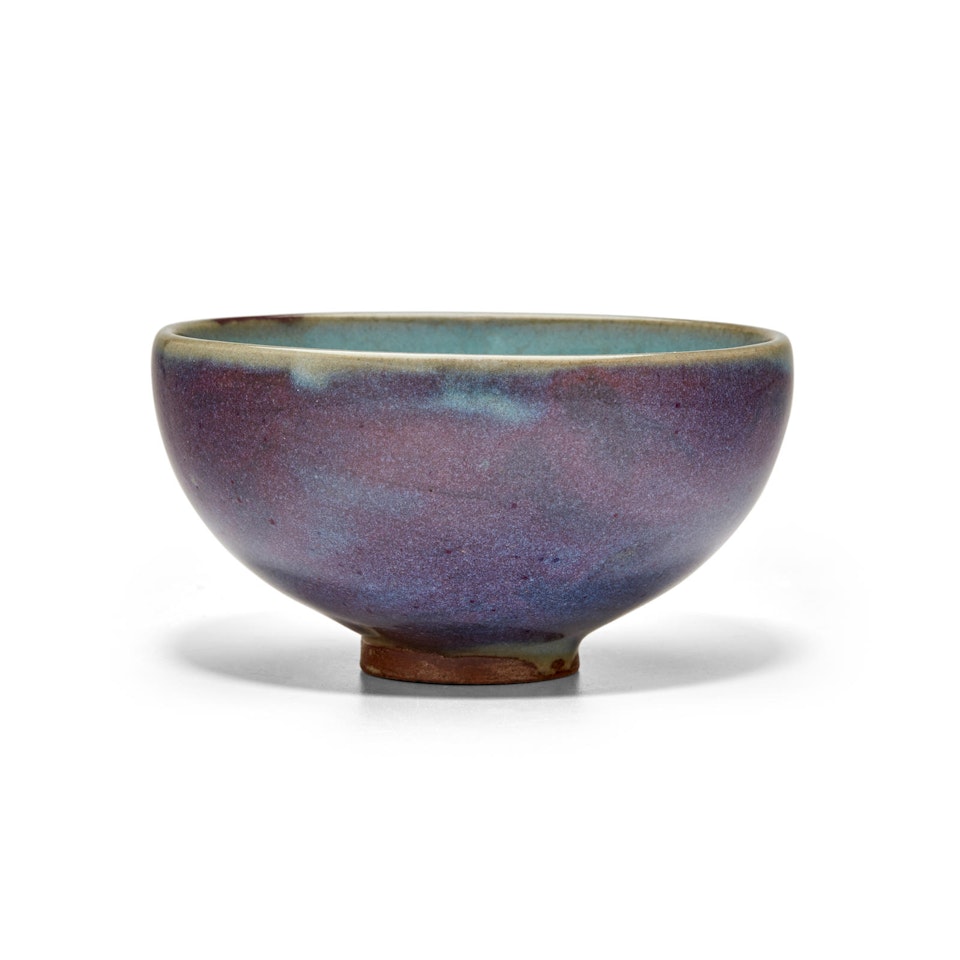 A JUNYAO PURPLE-SPLASHED TEA BOWL by Anonymous