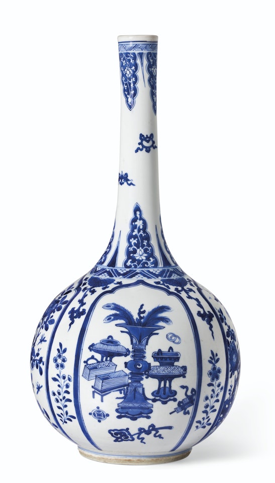 A BLUE AND WHITE BOTTLE VASE by Anonymous