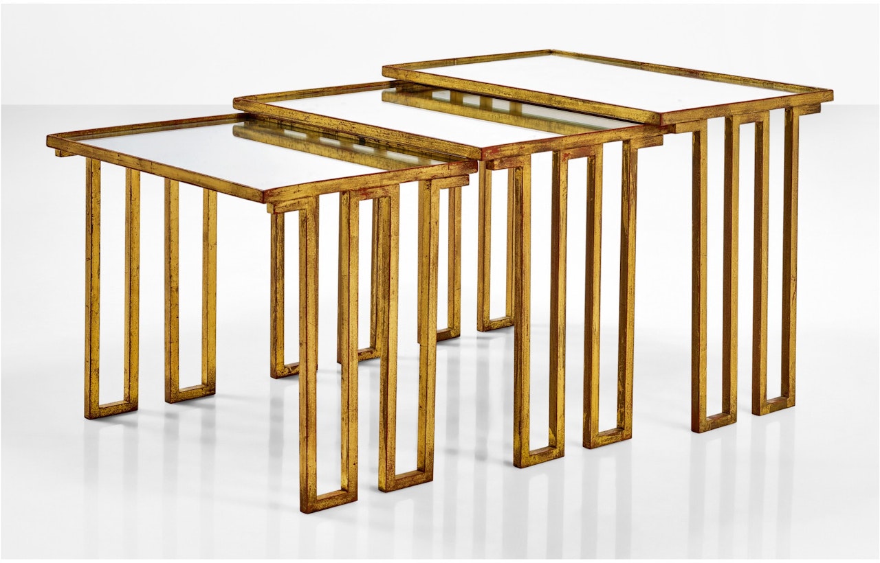 THREE "CRÉNEAUX" NESTING TABLES by Jean Royere
