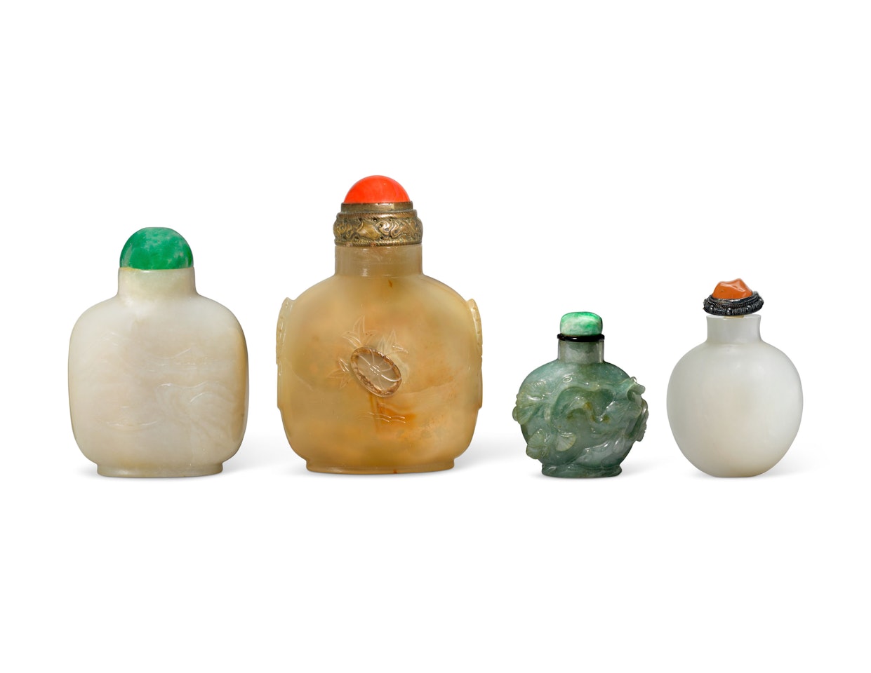 A GROUP OF FOUR CHINESE JADE, JADEITE AND AGATE SNUFF BOTTLES by Anonymous