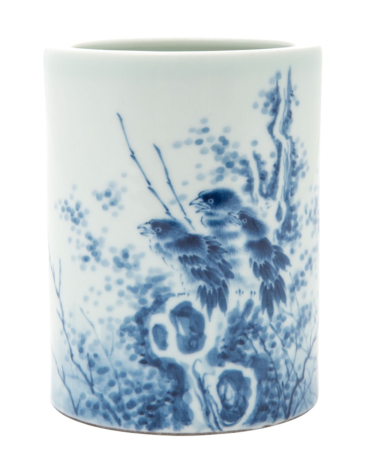 A CHINESE BLUE AND WHITE 'BIRD AND ROCK' BRUSH POT, BITONG by Anonymous