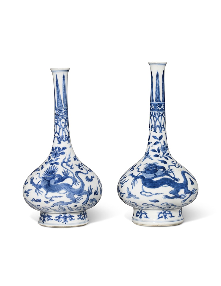 TWO BLUE AND WHITE ‘DRAGON’ BOTTLE VASES by Anonymous