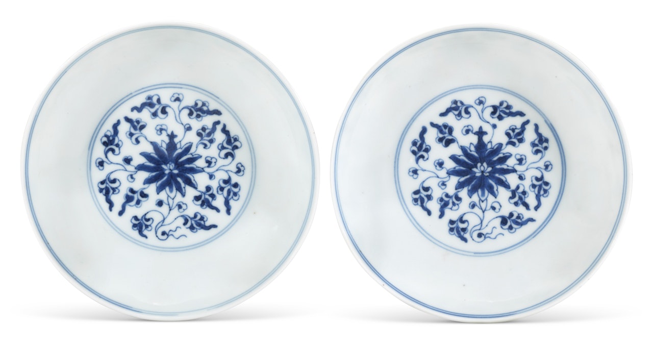 A PAIR OF BLUE AND WHITE 'LOTUS' DISHES by Anonymous