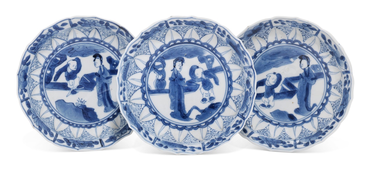 A SET OF THREE BLUE AND WHITE 'FIGURAL' SAUCER DISHES by Anonymous