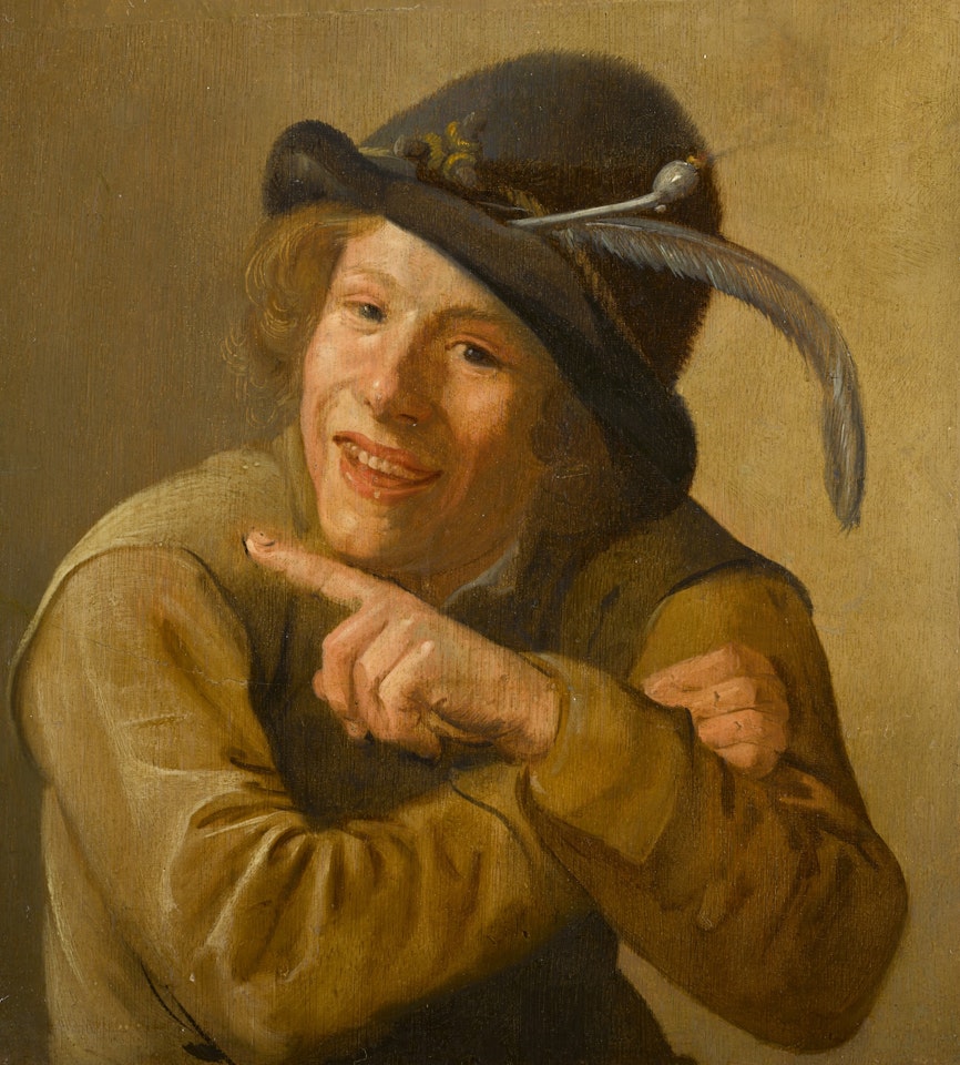 A SMILING YOUTH WEARING A BLACK HAT WITH A FEATHER AND A CLAY PIPE IN THE BRIM by Jan Miense Molenaer