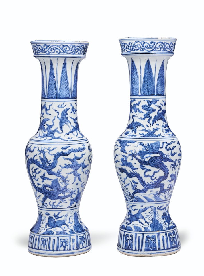 A PAIR OF BLUE AND WHITE TEMPLE VASES by Anonymous