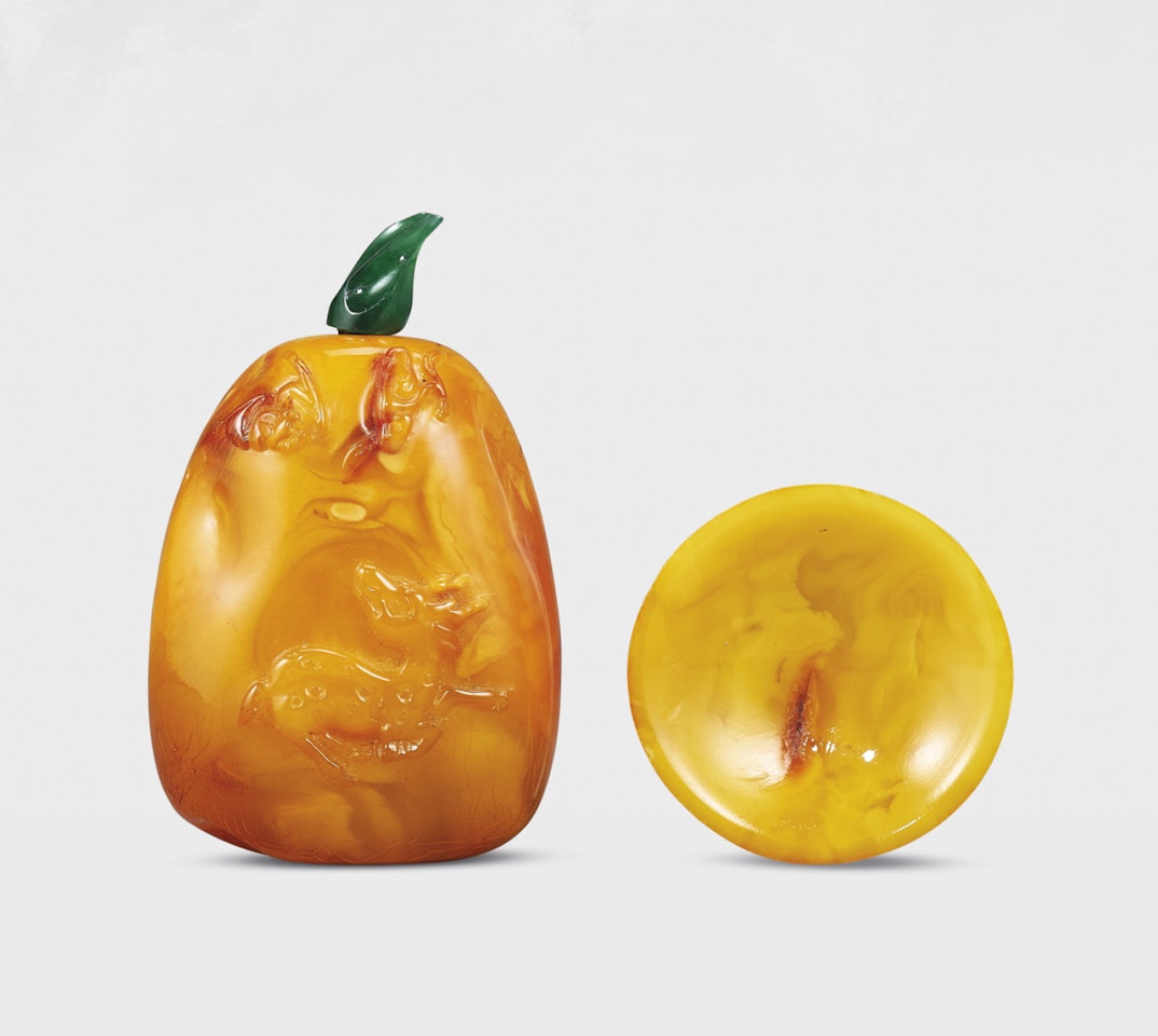 A CARVED AMBER ‘STAG AND BAT’ SNUFF BOTTLE by Anonymous