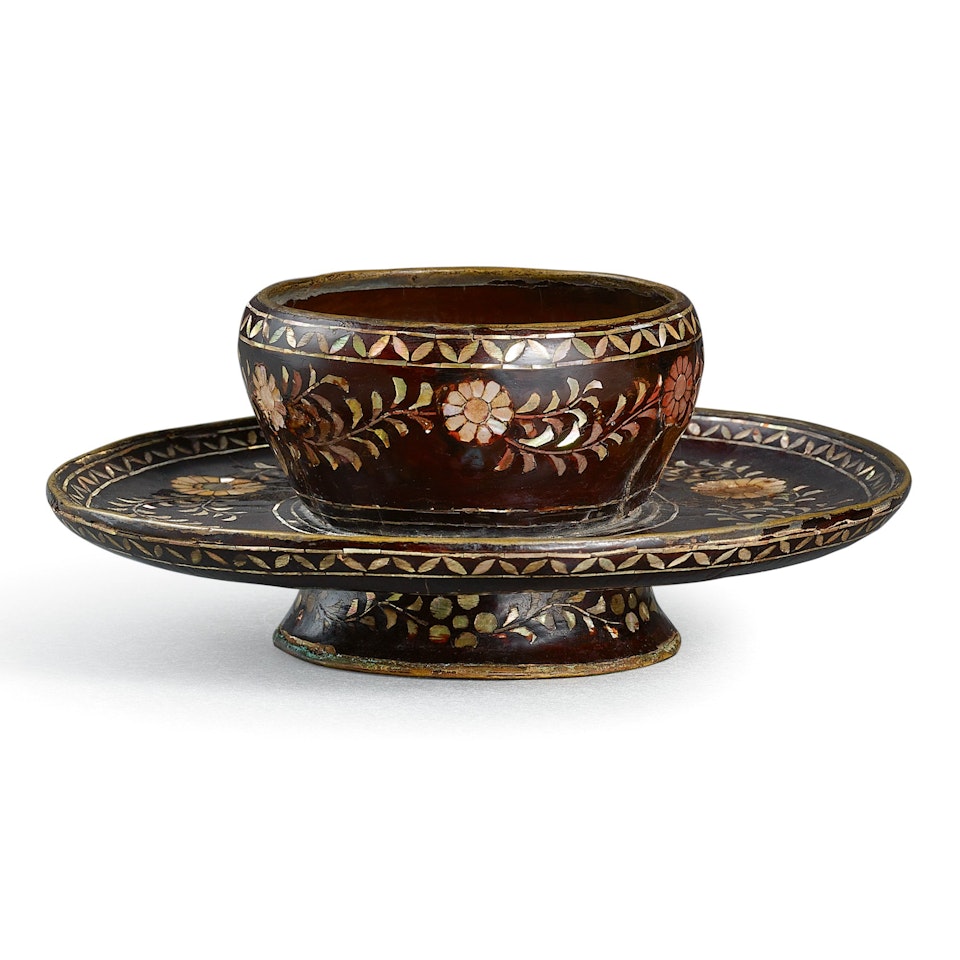 A MOTHER-OF-PEARL-INLAID BLACK LACQUER CUP STAND by Anonymous