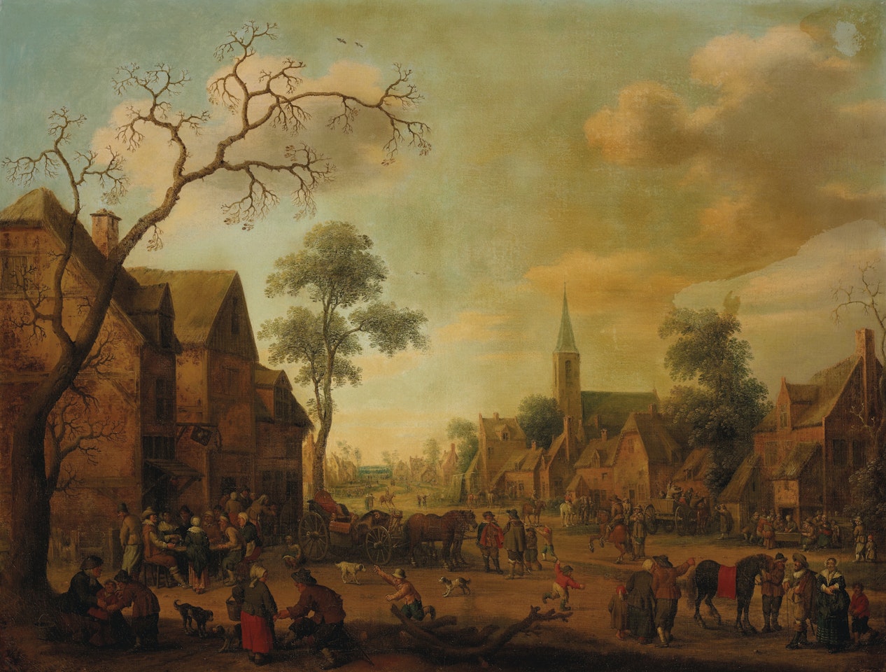 A village with townsfolk gathered in the street by Joost Cornelisz Droochsloot
