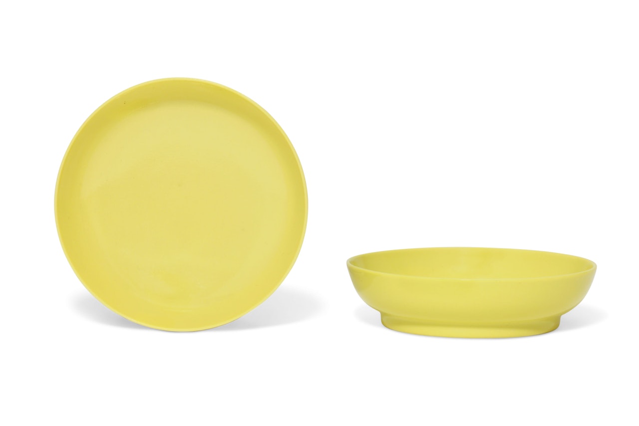 A PAIR OF SMALL LEMON-YELLOW-ENAMELLED DISHES by Anonymous
