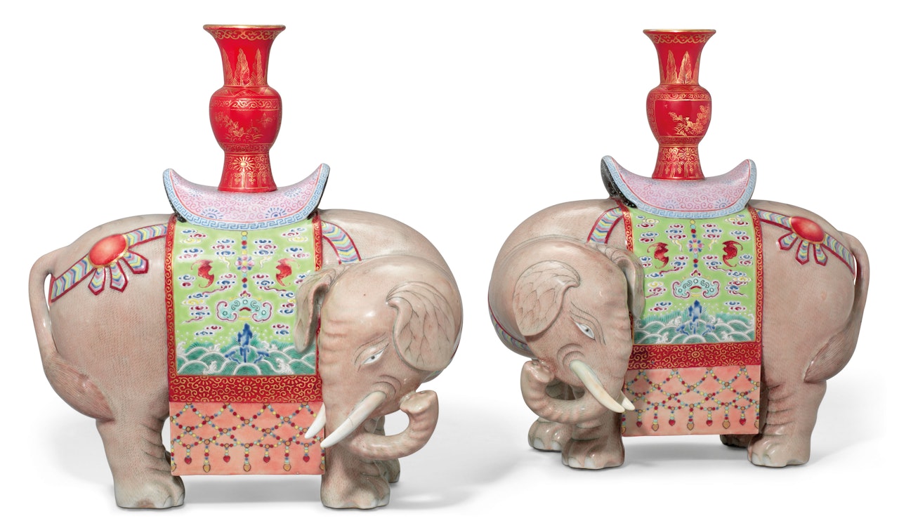 A PAIR OF FAMILLE ROSE 'ELEPHANT AND VASE' CANDLE HOLDERS, TAIPING YOUXIANG by Anonymous