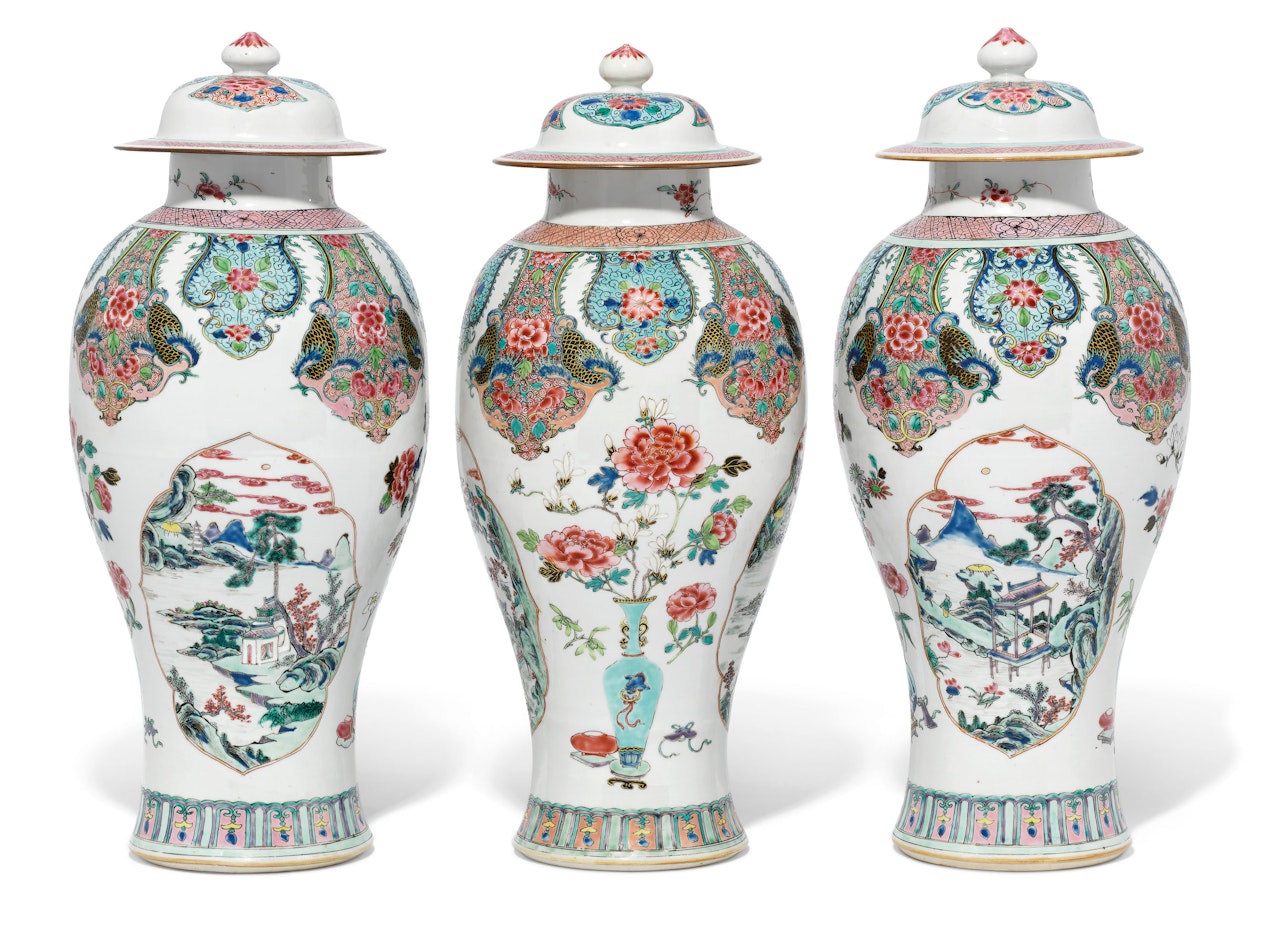 A LARGE SET OF THREE FAMILLE ROSE BALUSTER VASES AND COVERS by Anonymous