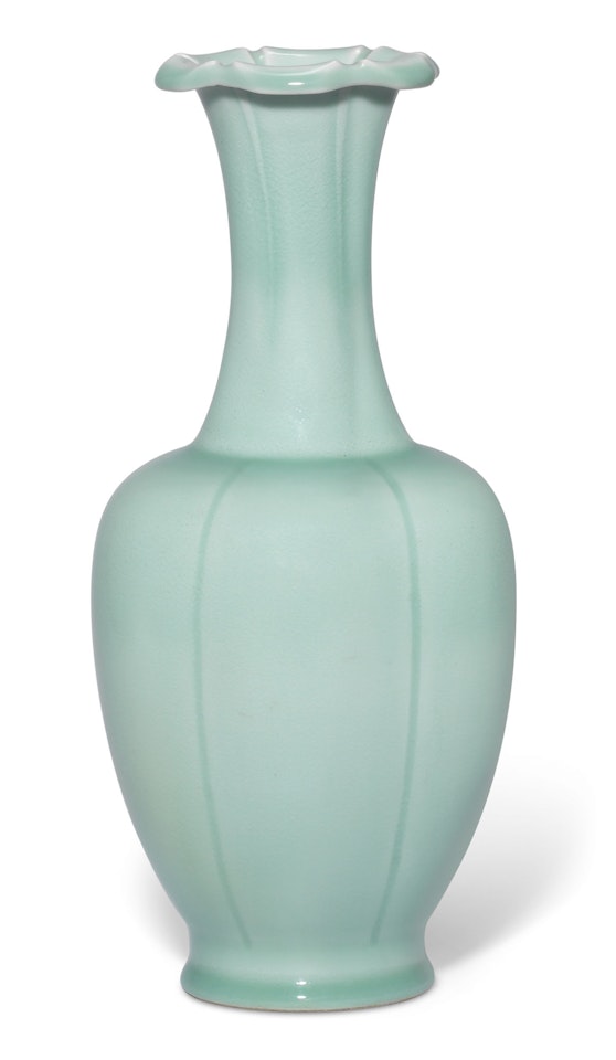 A CELADON-GLAZED FOLIATE VASE by Anonymous