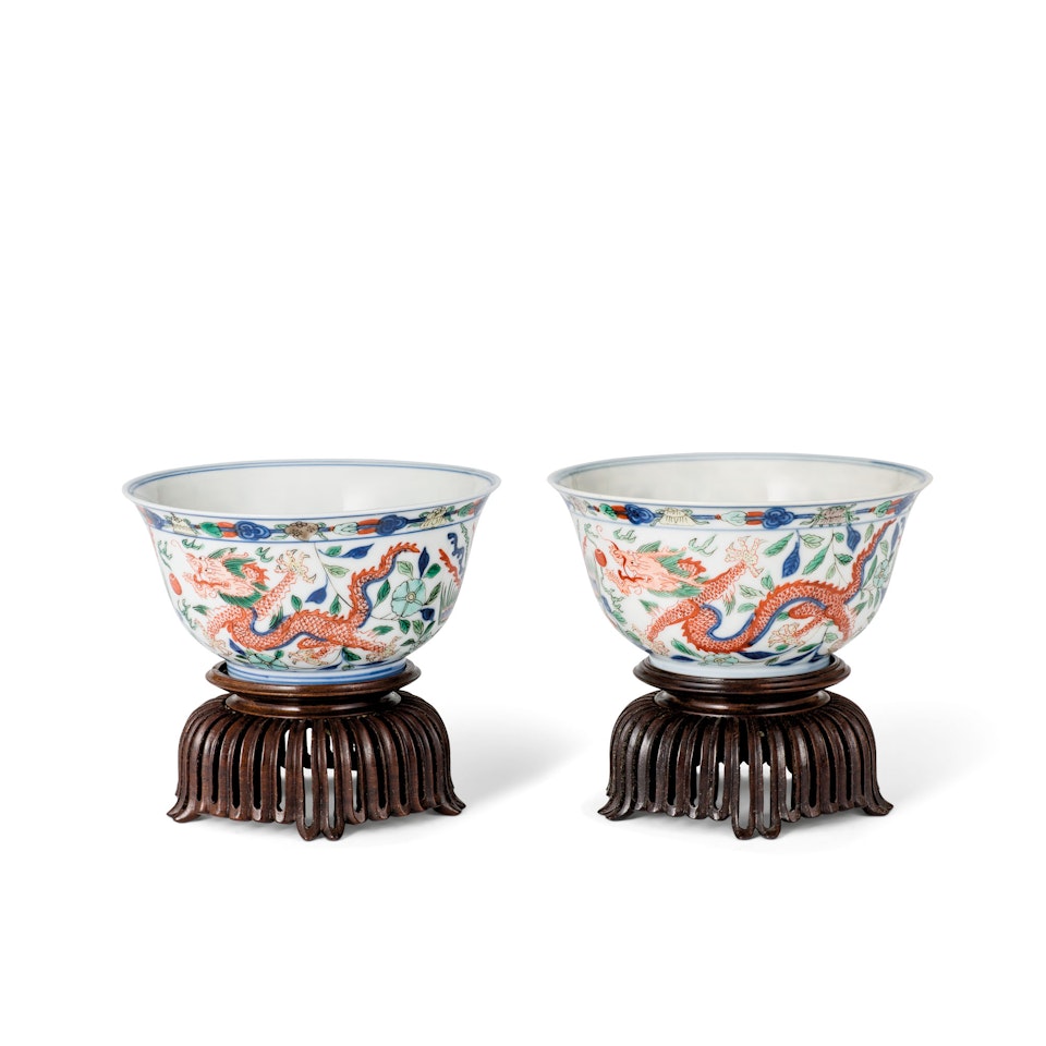 A RARE PAIR OF WUCAI 'DRAGON AND PHOENIX' BOWLS by Anonymous